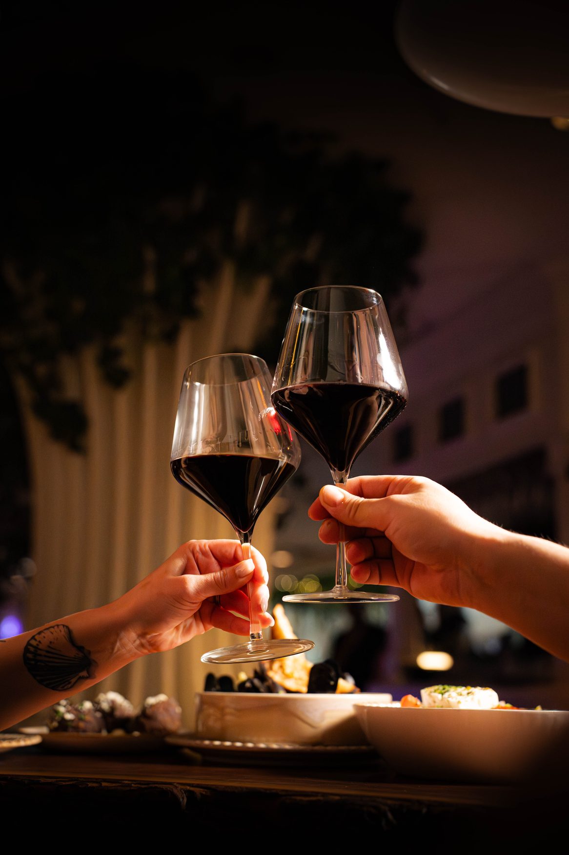A toast at the table at Santorini Estiatorio